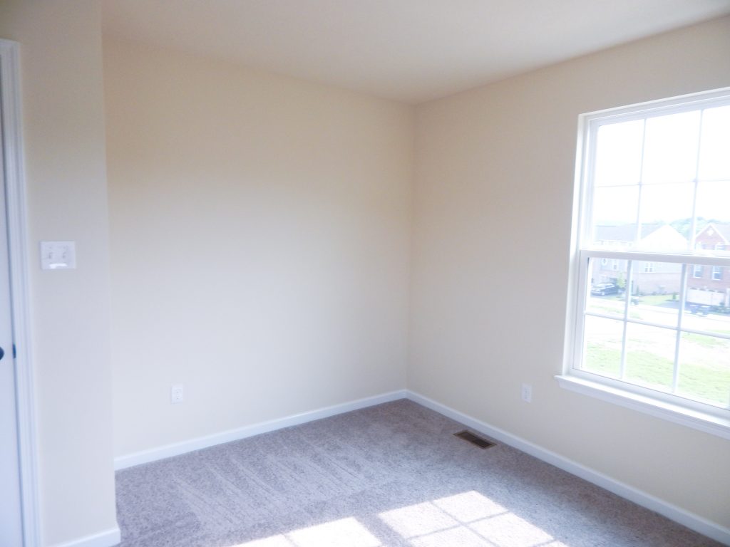 empty room with cream yellow walls