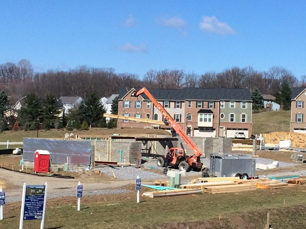 Construction Crane Placing Beams