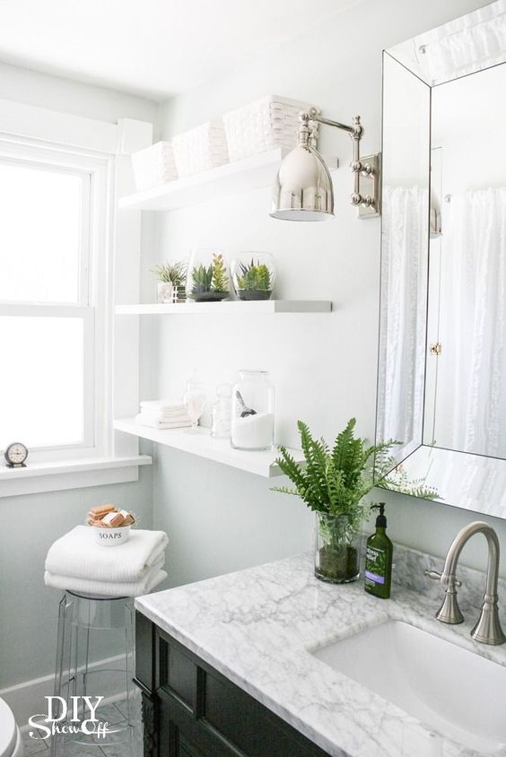 She shares her list of updates to transform her house into a home - this is the powder room list!