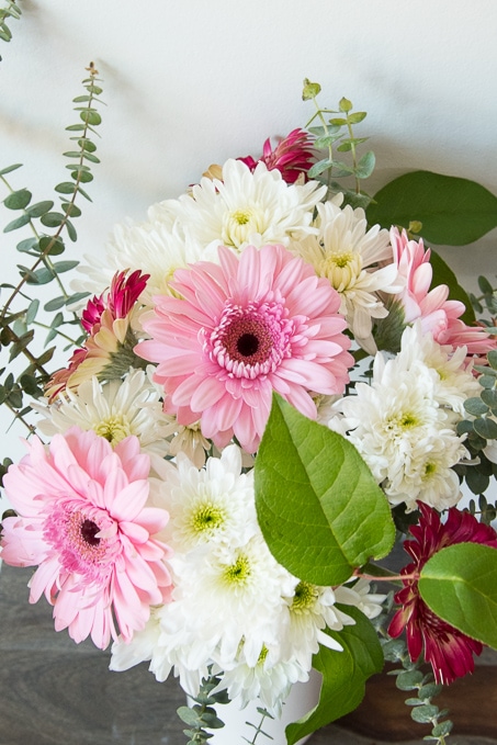 Easy method for creating professional looking flower arrangements and bouquets using grocery store flowers!