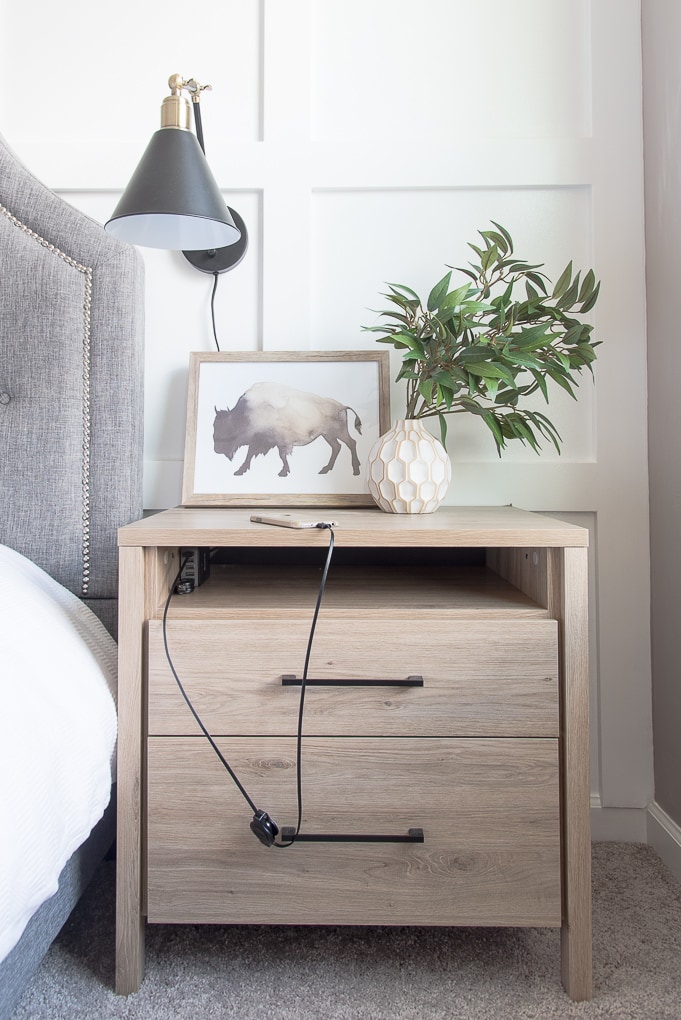 How to get rid of nightstand cable clutter. The best way to organize your wires and cords to create a charging station in your nightstand. Get rid of the mess once and for all!