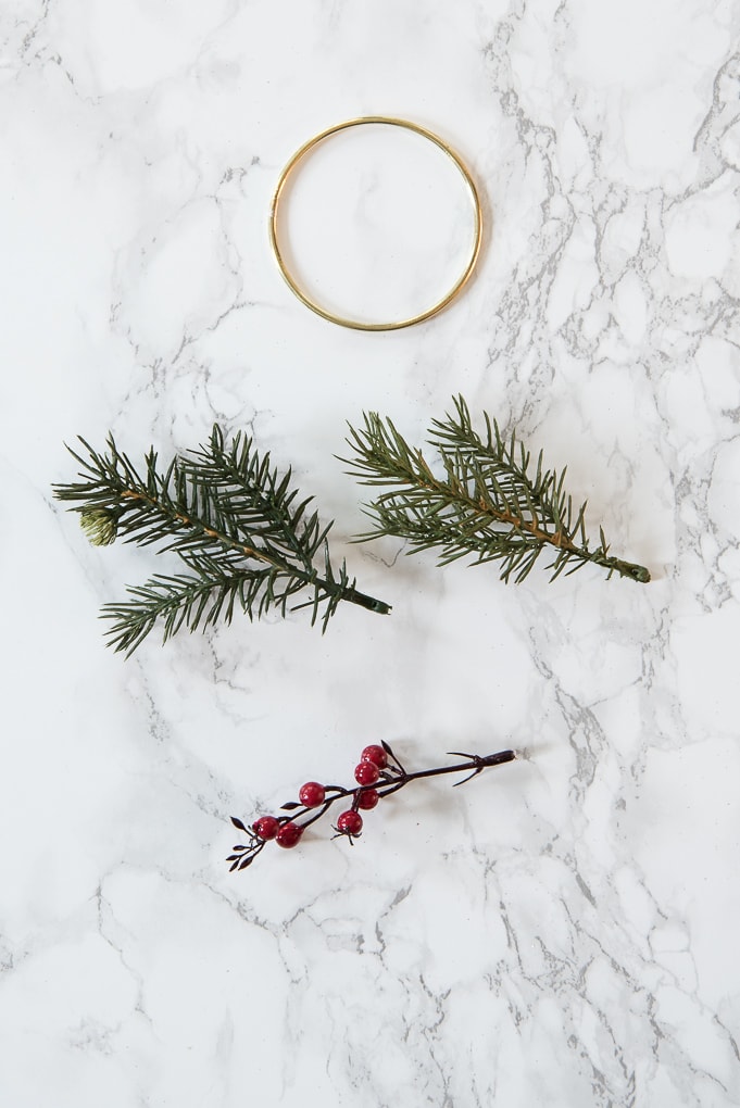 DIY Modern Christmas Wreath Ornament. Create this mini version of a modern gold wreath with faux greenery. Super easy tutorial for a cute ornament.