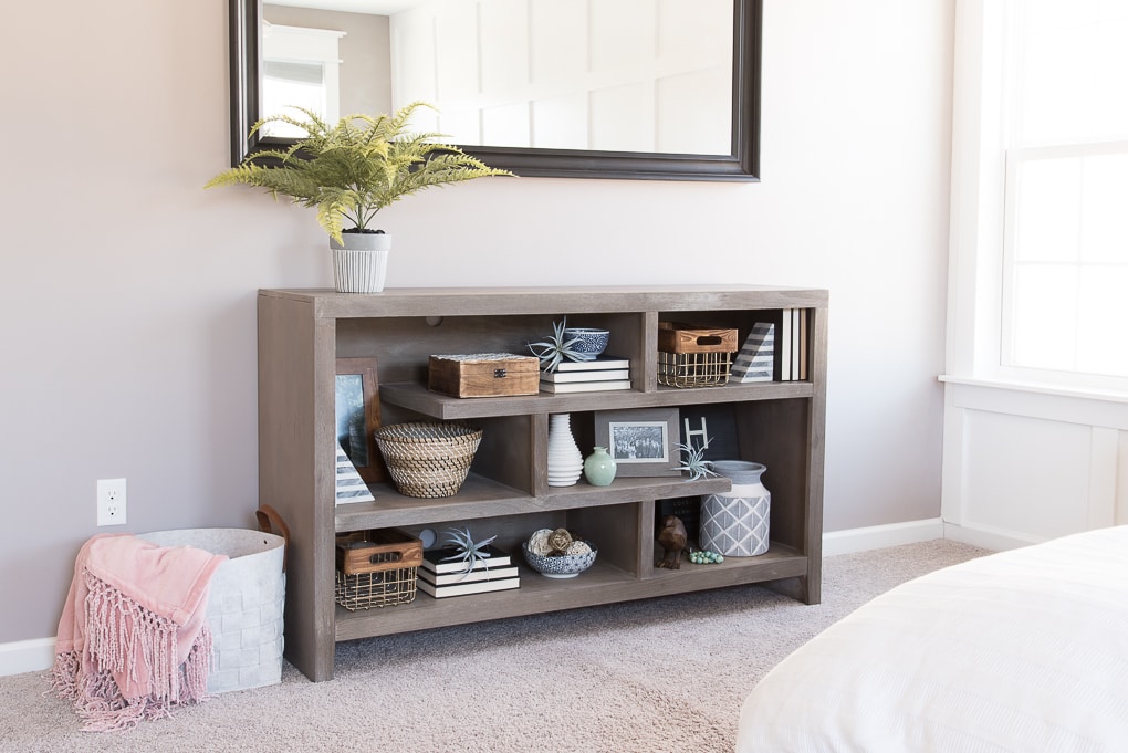 How to style bookshelves. Tips, tricks, and ideas for decorating shelves and bookcases with more than just books. Make your shelves look intentionally decorated and put together.