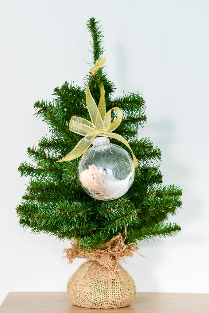 easy gold-dipped feather Christmas ornament on Christmas tree