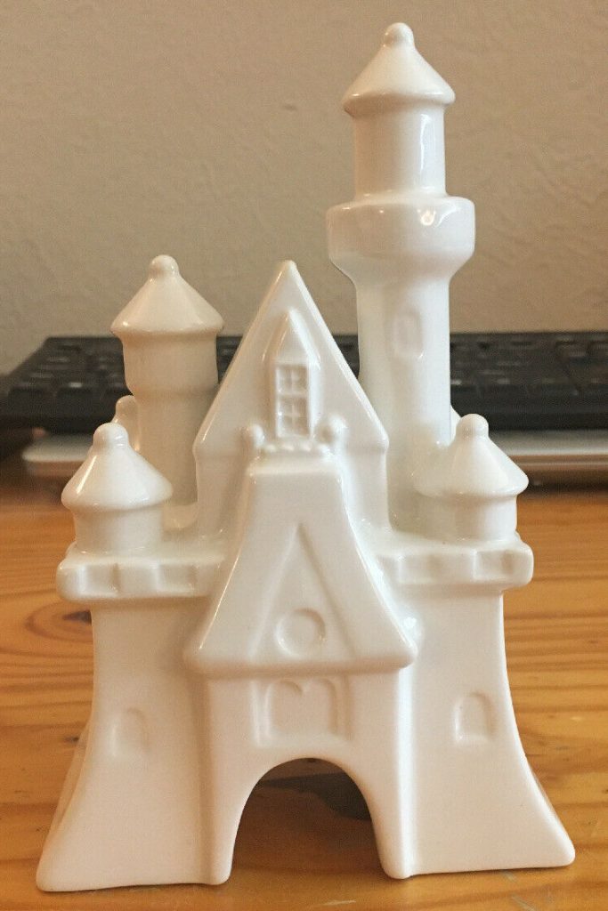 white ceramic Disney cinderella castle baby nursery