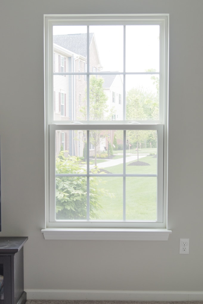 blank empty window without any window treatments new home construction