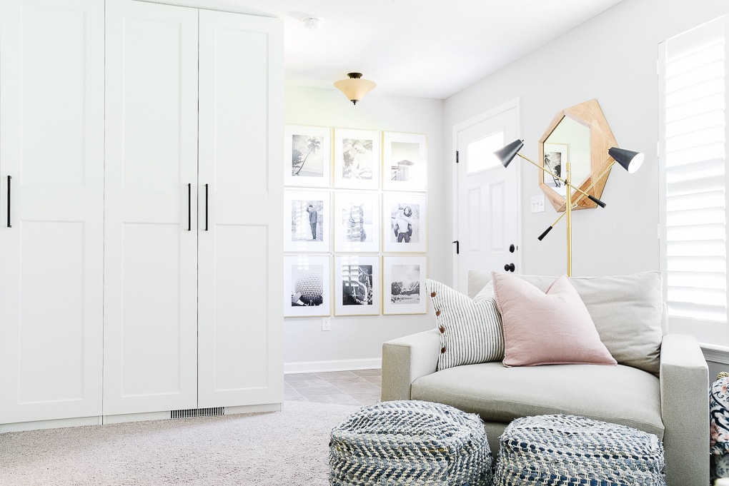 comfortable home office with storage cabinets and accent chair