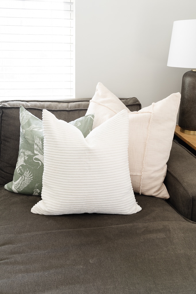 fall pillow trio on modern gray couch