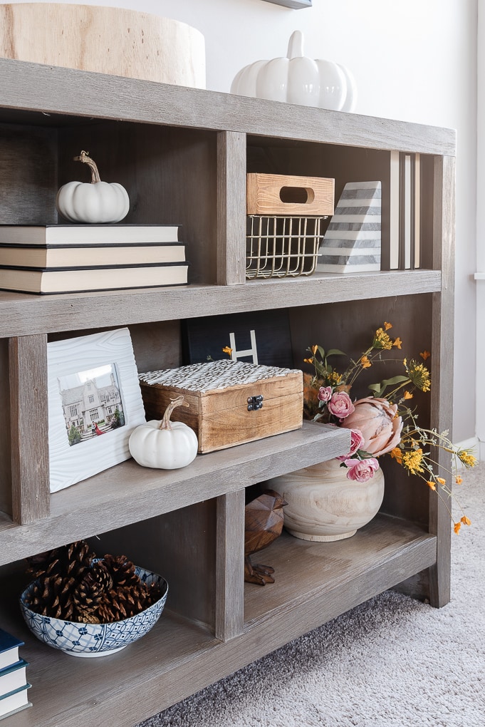 fall shelves decor with white mini pumpkin