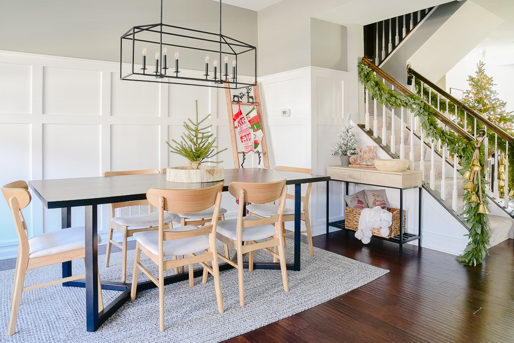 dining room decorated for Christmas with modern festive decor