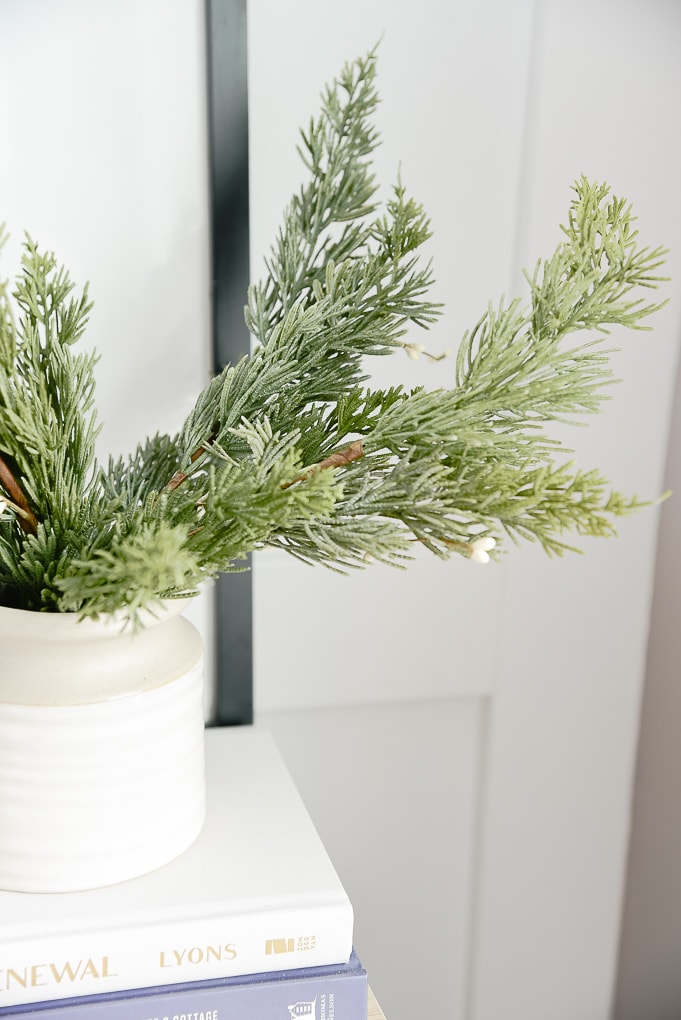 faux christmas greenery inside of a mcgee and co vase