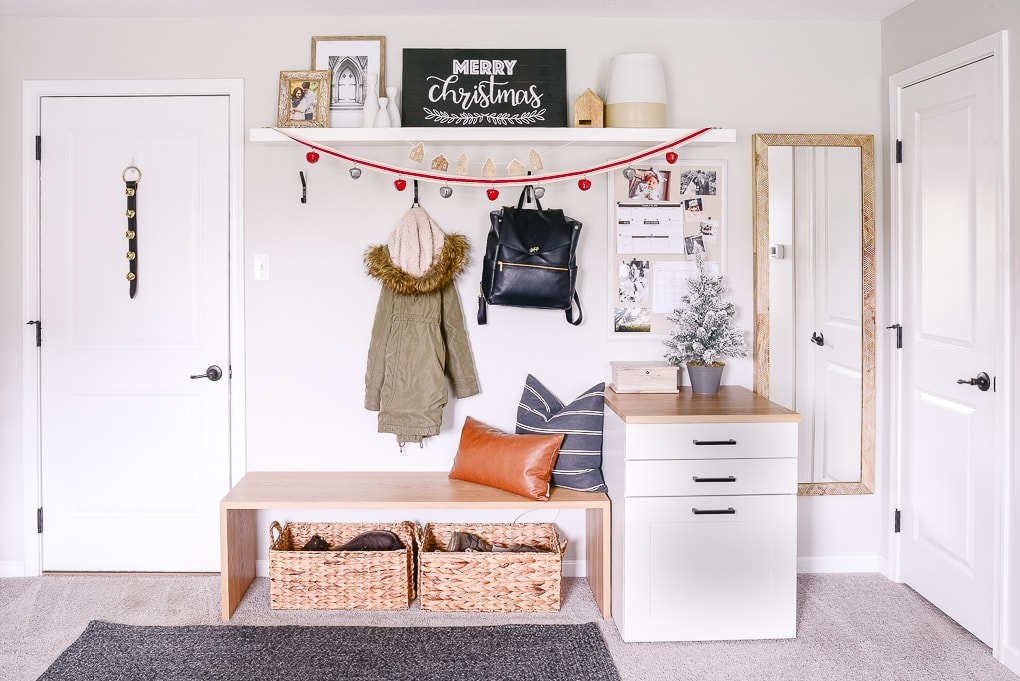 mudroom and entryway decorated for christmas