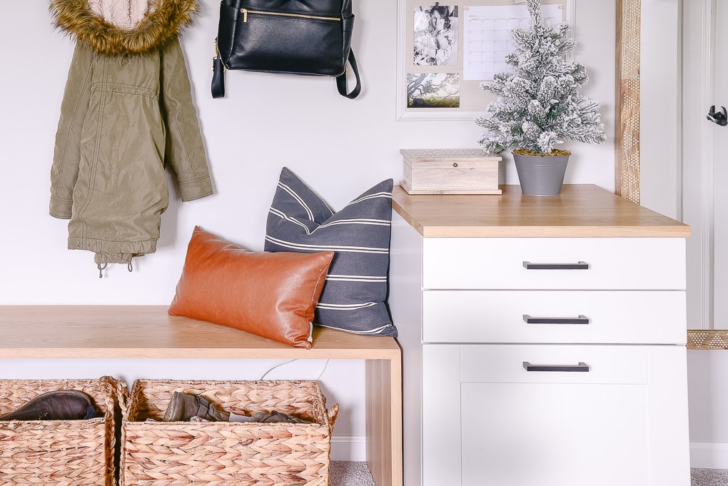 mudroom details bench pillows and tabletop christmas tree