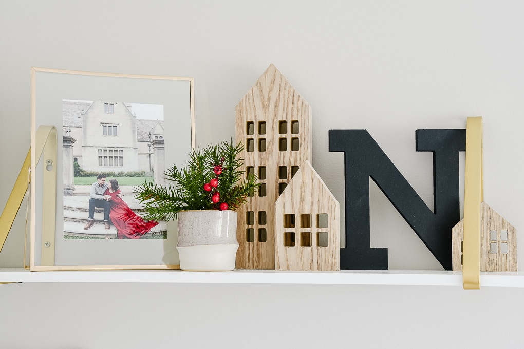 natural wooden houses from target on decorated christmas shelves