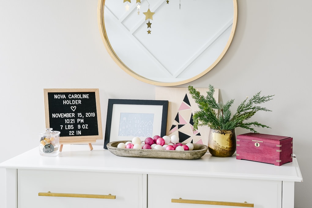 details on a nursery dresser decorated for Christmas