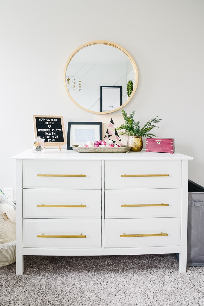 white dresser in nursery decorated for Christmas