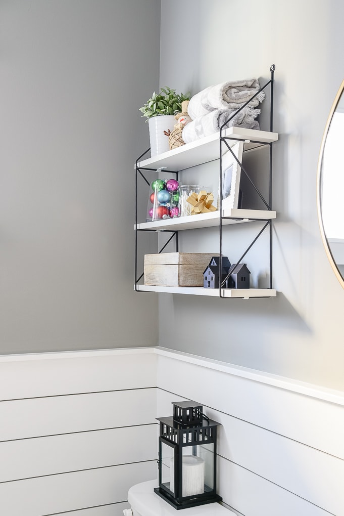 powder room shelves decorated for Christmas