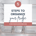 A refrigerator is shown with a text overlay that says "5 Steps to Organize Your French Door Refrigerator" along with the website "CHRISTENEHOLDERHOME.COM". The fridge appears clean and empty, with clear shelving and compartments.