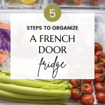 Open French door fridge with fresh produce including apples, tomatoes, celery, and carrots in clear drawers. Text on image reads "5 Steps to Organize a French Door Refrigerator" with "christeneholderhome.com" at the bottom.