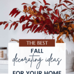 A white background with a ceramic vase holding red and orange autumn leaves on a white surface. Text overlay reads "The Best Fall Decorating Ideas for Your Home" with a URL at the bottom: christeneholderhome.com. A white candle is partially visible in the background, enhancing your Fall Decorating Ideas.