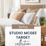 A cozy bedroom scene showcasing the Studio McGee Target Spring Collection. The room features a neutral-colored bed with multiple pillows, a wicker headboard, a woven throw blanket, and two white bedside lamps. A plant on a nightstand and framed wall art complete the decor.