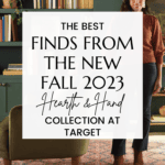 A cozy living room setup featuring a woman standing beside a green armchair with decorative pillows. Behind her is a green bookshelf and matching green cabinetry decorated with plants and books. Text overlay reads, "The best finds from the new Fall 2023 Hearth & Hand with Magnolia Collection at Target.