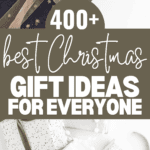 A festive image showcasing gift boxes wrapped in elegant paper with ribbon bows. The text overlay reads: "400+ Best Christmas Gift Ideas for Everyone." Discover more in our comprehensive Christmas Gift Guide. URL included at the bottom.