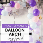 A colorful balloon arch made of purple, pink, white, and transparent balloons filled with confetti decorates a room. A text overlay says, "How to Make a Balloon Arch Easy Tutorial," with "christeneholderhome.com" at the bottom. Dive into this balloon arch tutorial for a festive touch!