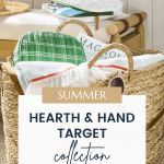 A woven basket on a light rug holds a green-checkered pouch, a white cloth, and a magazine. Behind the basket, a wooden bench with a white cushion and another pouch is visible. Text overlay reads, "Hearth and Hand with Magnolia Target Summer Collection," and a URL, christeneholderhome.com.