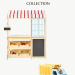 An image showcases the Hearth and Hand with Magnolia Target Summer Collection by Christene Holder Home. It features a wooden play market stand with a striped red and white canopy, shelves, and a chalkboard, alongside a blue and yellow toy dump truck.