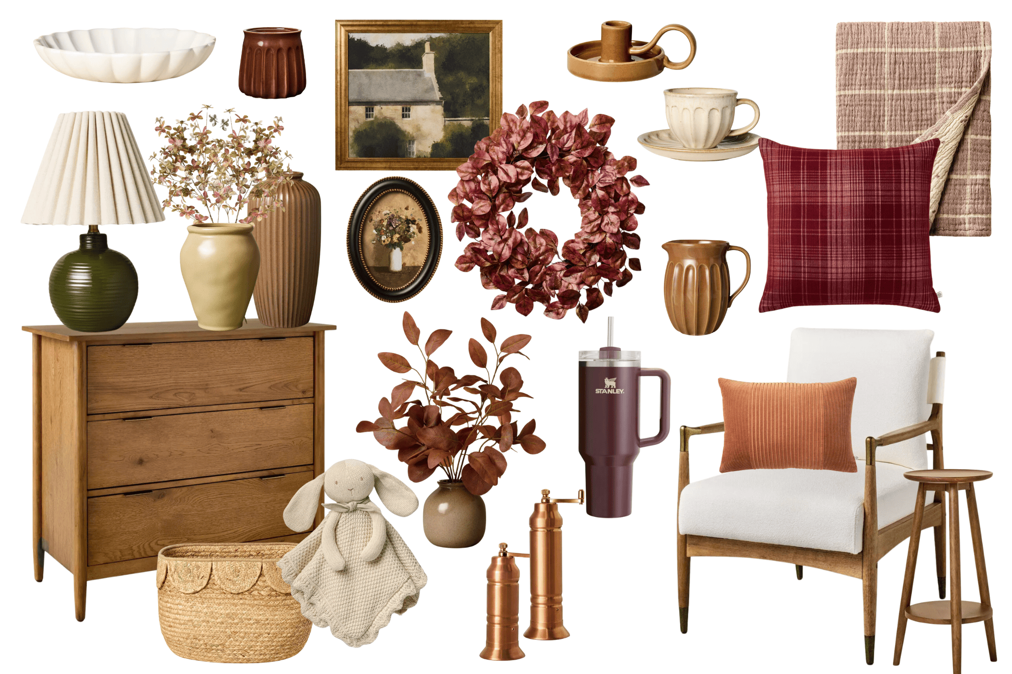 A collection of home decor items from the Hearth and Hand with Magnolia Target Fall Collection, including wooden furniture, ceramic vases, cushions, lamps, dried flowers, a framed painting, a wreath, and various small accessories in earthy tones such as brown, beige, and maroon.