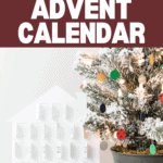 A white house-shaped advent calendar with numbered doors sits next to a small Christmas tree decorated with colorful ornaments. The text "DIY Modern Advent Calendar" is displayed above. At the bottom, the website "www.christeneholderhome.com" is shown.